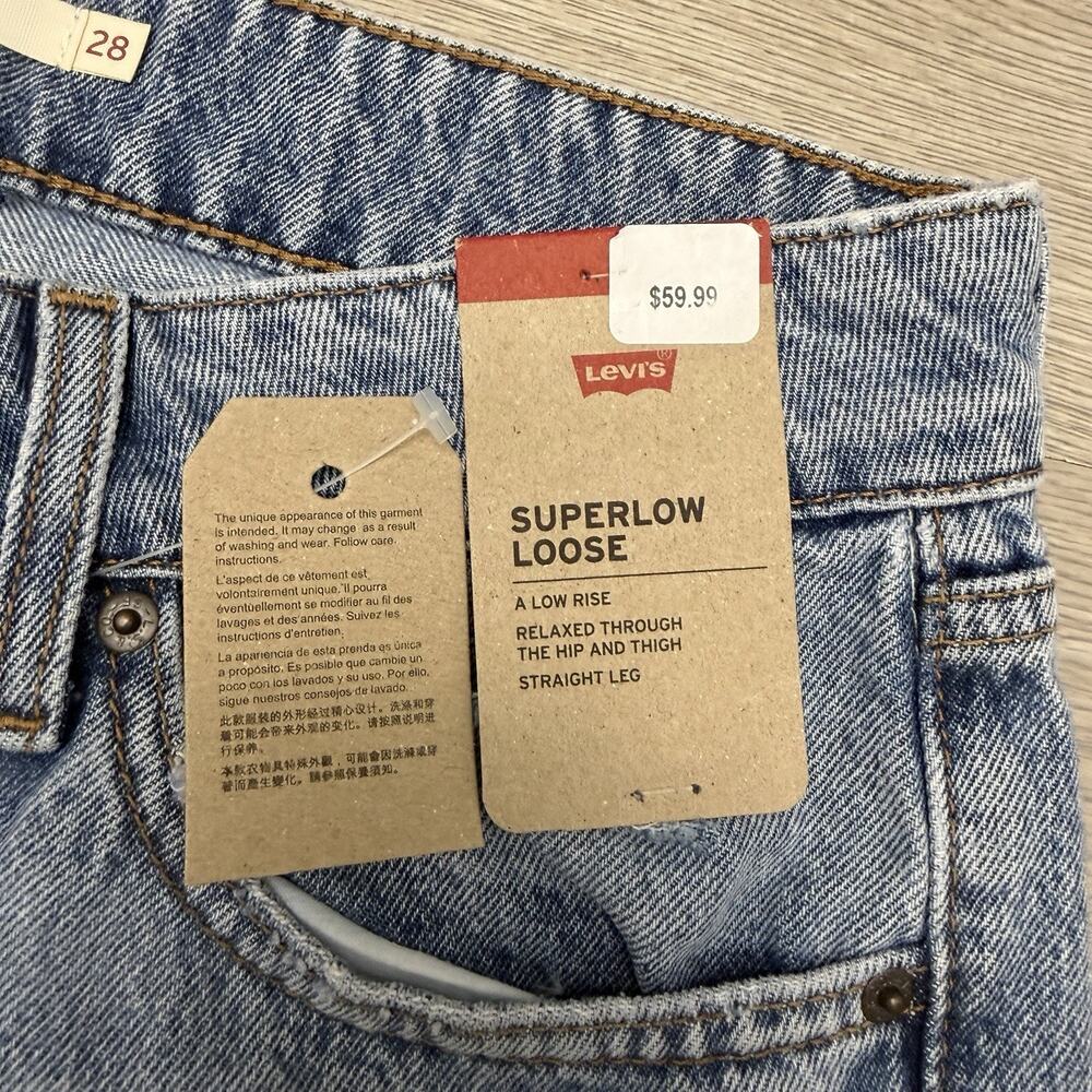 Levis Superlow Loose Jeans Womens 28x32 NWT Light Wash Distressed Wide Leg - Picture 4 of 13